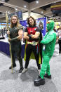 <p>Cosplayers dressed as Aquaman, Robin, and Ambush Bug from DC Comics at Comic-Con International on July 21, 2018, in San Diego. (Photo: Angela Kim/Yahoo Entertainment) </p>