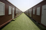 A general view of a fan village is seen Thursday, Nov. 10, 2022 in Doha, Qatar. Qatar unveiled a 6,000-cabin fan village in an isolated lot near its airports, an offering for housing toward the lower end of what's available for the upcoming World Cup just days away from starting. (AP Photo/Hussein Sayed)