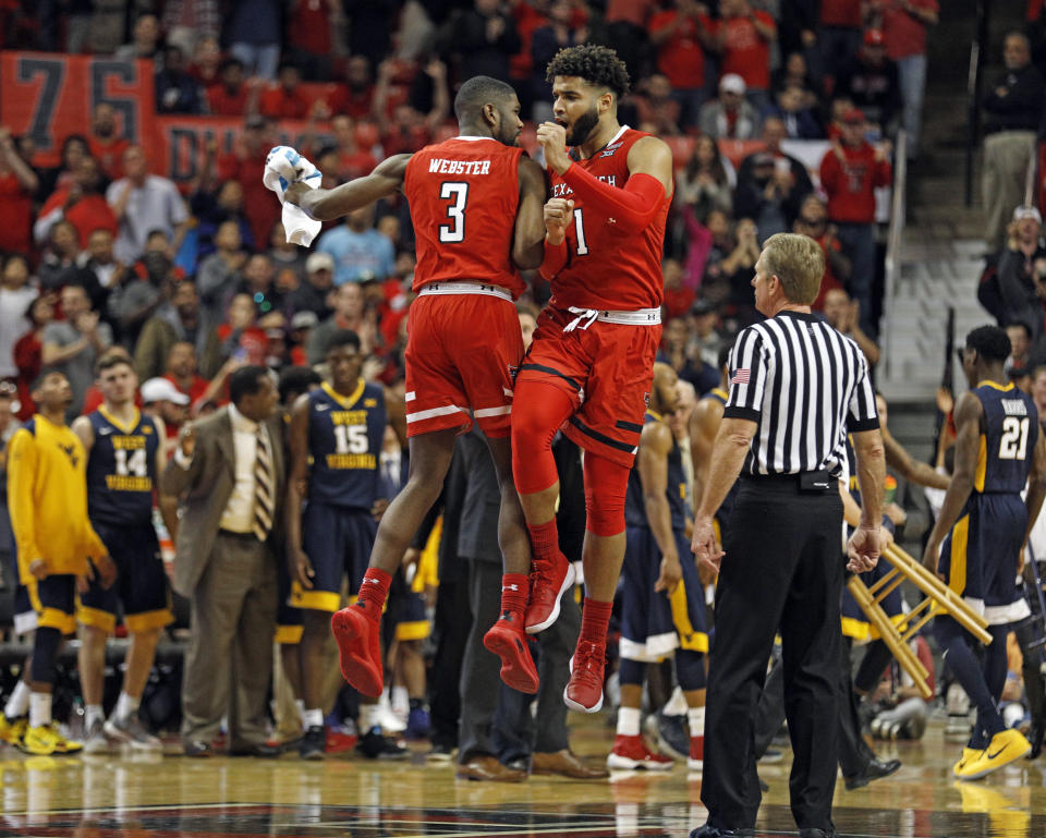 Texas Tech’s Josh Webster (3) and Brandone Francis (1) celebrate during the second half of an NCAA college basketball game against West Virginia, Saturday, Jan. 13, 2018, in Lubbock, Texas. (AP Photo/Brad Tollefson)