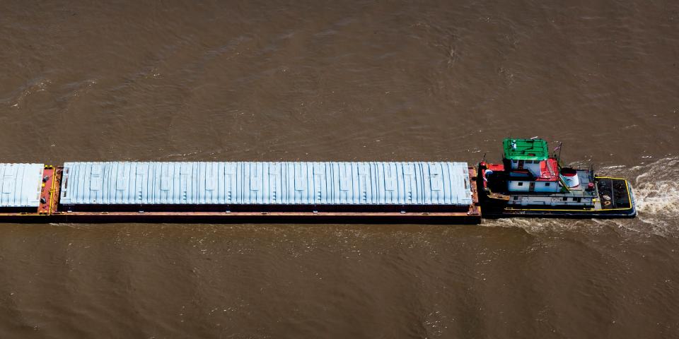 Barge seen from the Gateway Arch looking down on the Mississippi River, St. Louis, Missouri.