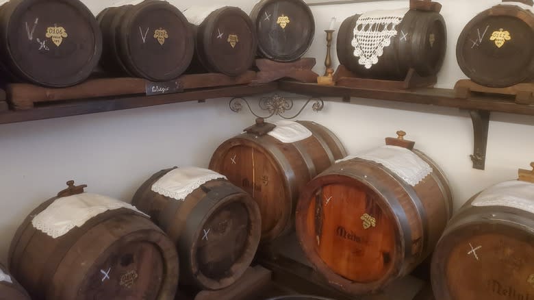 balsamic vinegar casks on shelves