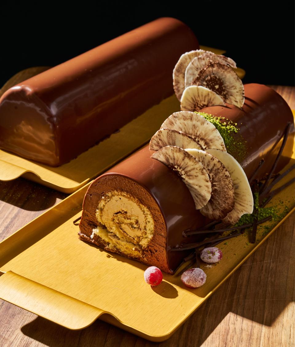 A gorgeous bûche in the newly updated Tartine cookbook—Claire and I discussed the ingenious white chocolate mushrooms here, which look SO REAL.