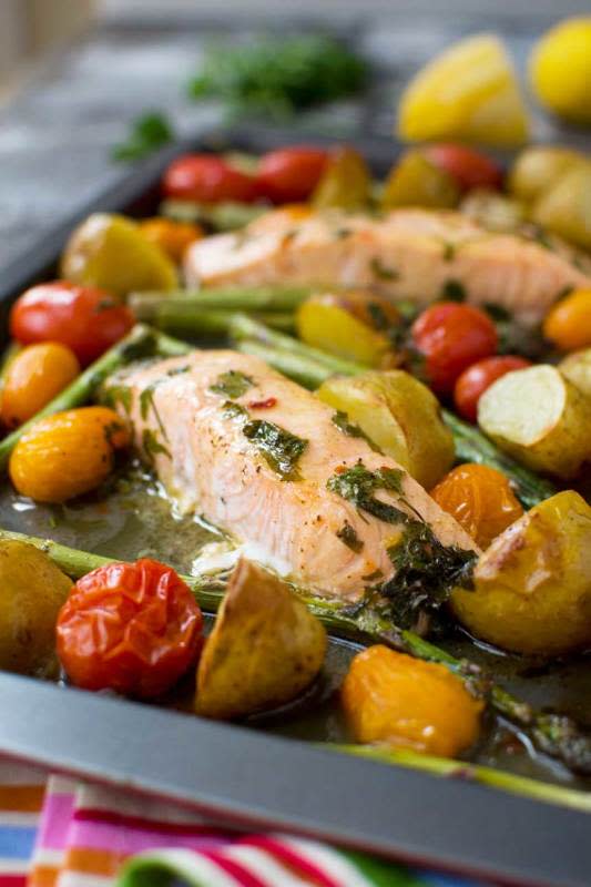 <p>Scrummy Lane</p><p>Bursting with the flavors of spring this will be a family favorite for sure. Grab the recipe <a href="https://scrummylane.com/lemon-butter-sheet-pan-salmon-with-asparagus-and-potatoes/" rel="nofollow noopener" target="_blank" data-ylk="slk:here;elm:context_link;itc:0;sec:content-canvas" class="link ">here</a>.</p>