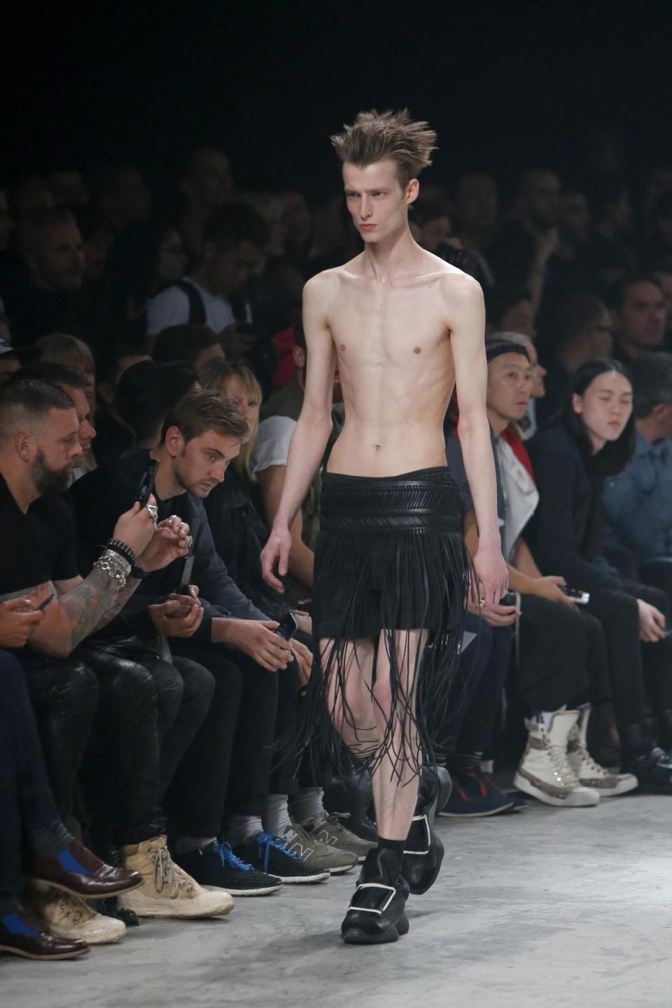 A model wears a creation by fashion designer Rick Owens as part of his men's fashion Spring-Summer 2014 collection, presented Thursday, June 27, 2013 in Paris. (AP Photo/Francois Mori)