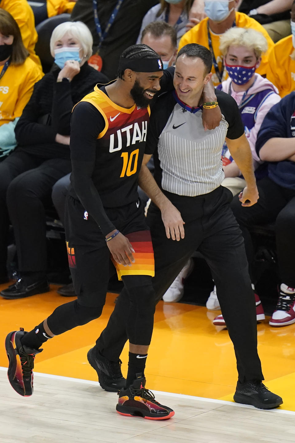 FILE - Utah Jazz guard Mike Conley (10) walks with referee Kane Fitzgerald during the first half of Game 2 of their NBA basketball first-round playoff series against the Memphis Grizzlies Wednesday, May 26, 2021, in Salt Lake City. The NBA Replay Center has a new leader. Kane Fitzgerald, who spent 13 years working as an NBA referee, has been announced as the league’s new Vice President of Referee Operations and Replay Center Principal. Fitzgerald officially started his new job Sunday, Sept. 18, 2022.(AP Photo/Rick Bowmer, File)