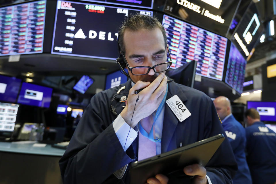 Trader Gregory Rowe works on the floor of the New York Stock Exchange, Thursday, May 23, 2019. Stocks are falling at the open on Wall Street as investors worry about an apparent stalemate in trade talks between the U.S. and China. (AP Photo/Richard Drew)