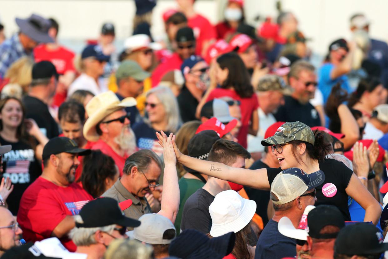 Donald Trump supporters attend a rally at the Minden-Tahoe Airport in Nevada on 12 September. (AP)