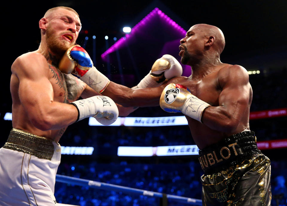 Floyd Mayweather Jr. and Conor McGregor in action during a bout at T-Mobile Arena in Las Vegas on August 26, 2017. (Reuters)