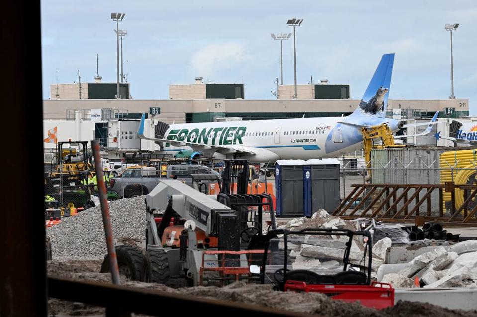 Construction workers paused as House Speaker Mike Johnson, R-La., toured the construction site for the $70 million ground-level passenger terminal at Sarasota Bradenton International Airport.