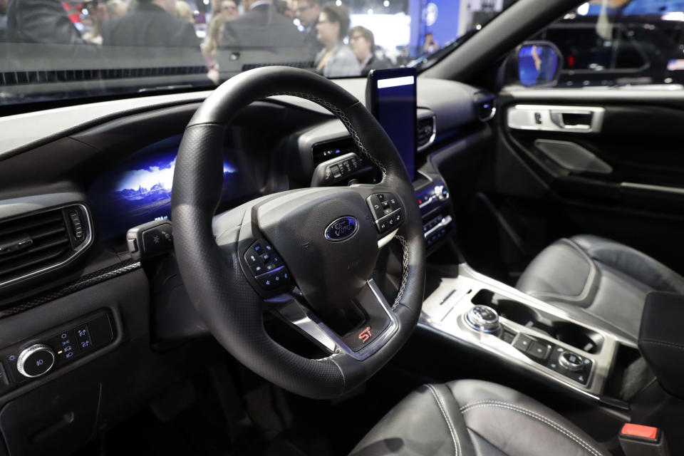 FILE- In this Feb. 7, 2019, A Ford Explorer is displayed during the media preview of the Chicago Auto Show at McCormick Place in Chicago.Ford says it has launched an investigation into whether a flawed mathematical model caused it to overstate gas mileage and understate pollution from a wide range of vehicles. The company says a group of employees reported possible problems with the model in September. So it has hired an outside firm to test the 2019 Ford Ranger. If problems are found, then Ford will start looking at models going back to 2017. (AP photo/Nam Y. Huh, File)