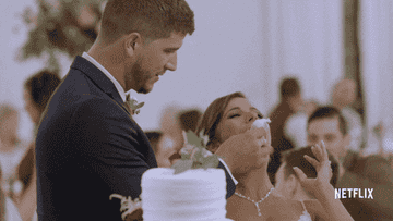 A bride eating her cake