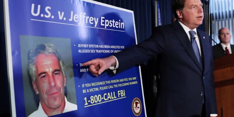 FILE PHOTO: Geoffrey Berman, United States Attorney for the Southern District of New York, points to a photograph of Jeffrey Epstein as he announces the financier's charges of sex trafficking of minors and conspiracy to commit sex trafficking of minors, in New York, U.S., July 8, 2019. REUTERS/Shannon Stapleton/File Photo