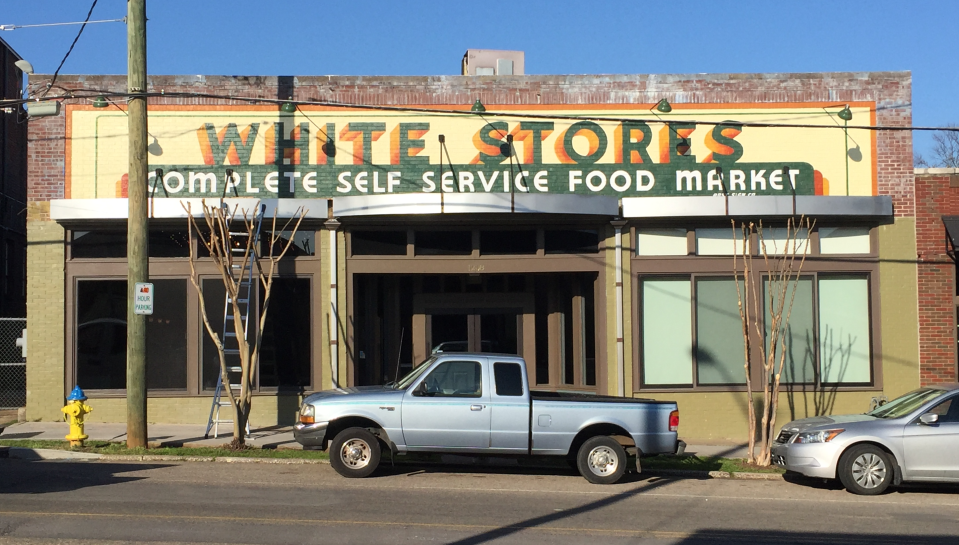 After the owners of Relix Variety Theatre saw Bud Ries restoring The Original Freezo signage, they asked him to restore the original White Stores ghost sign on the front of their building.