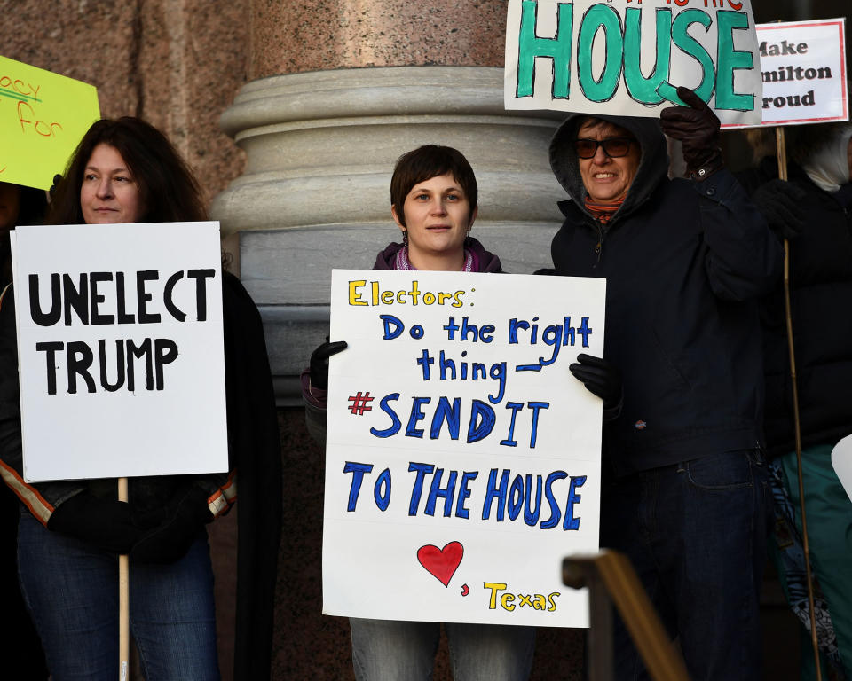 Anti-Trump protesters gather as Electoral College votes