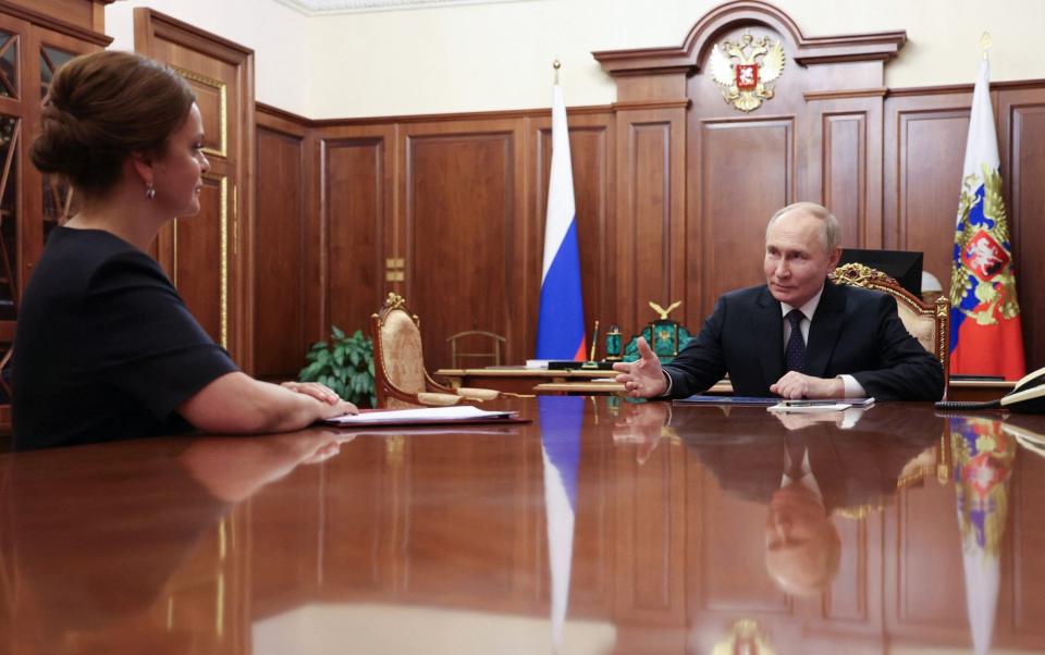 Anna Tsivileva, who also runs the 'Defenders of the Fatherland' - a fund for war veterans, meets with Vladimir Putin
