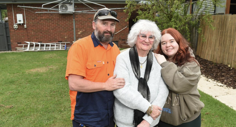 Rachael Robinson and her family in their home's backyard. 