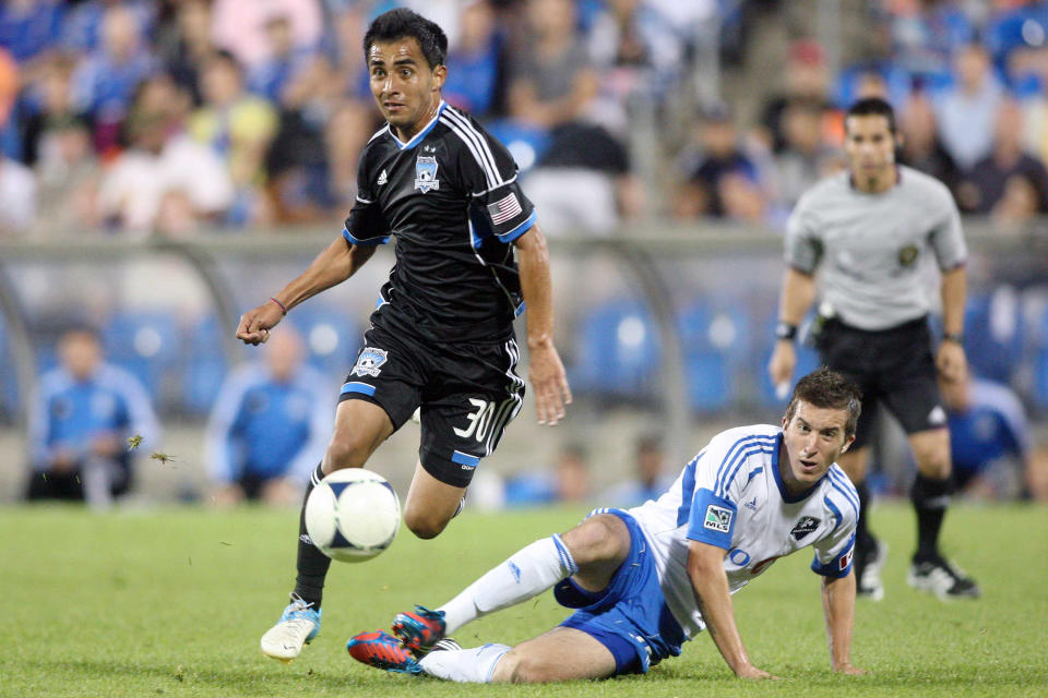 MONTREAL, CANADA - AUGUST 18: Rafael Baca #30 of the San Jose Earthquakes moves the ball past Jeb Brovsky #15 of the Montreal Impact during the match at the Saputo Stadium on August 18, 2012 in Montreal, Quebec, Canada. (Photo by Richard Wolowicz/Getty Images)