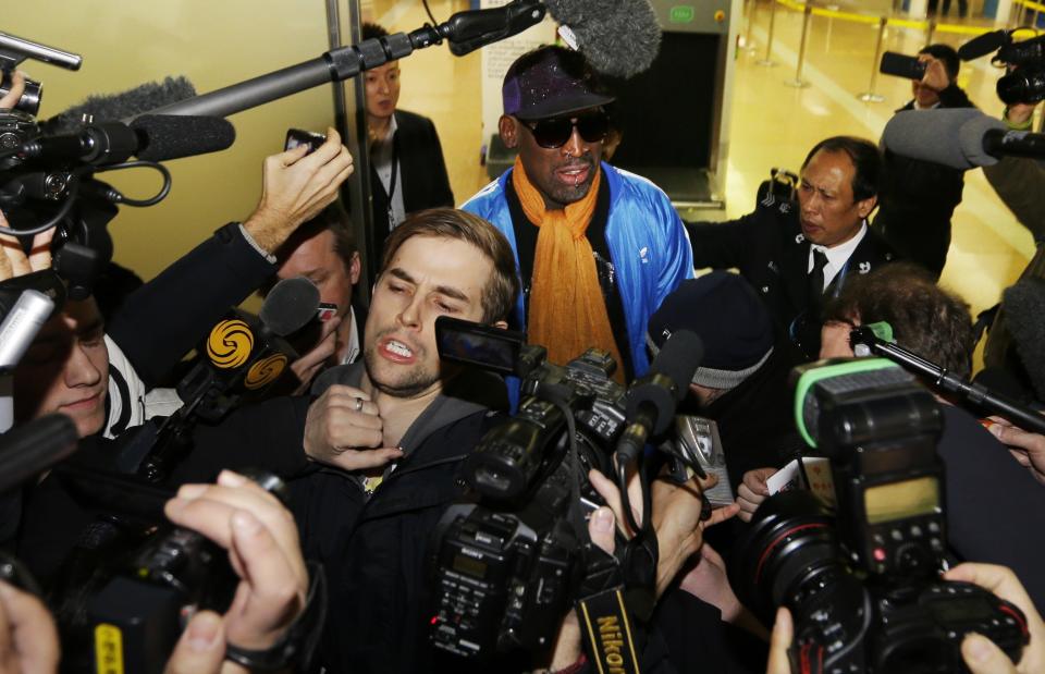 Dennis Rodman speaks to the media at Beijing Capital International Airport