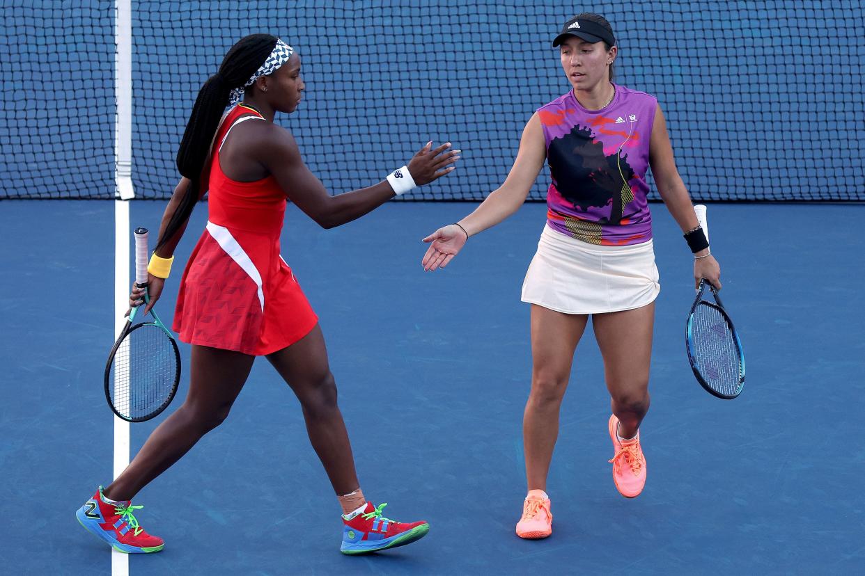 (L-R) Coco Gauff of the United States and Jessica Pegula of the United States celebrate a point during their Women's Doubles First Round match against Leylah Fernandez of Canada and Daria Saville of Australia on Day Four of the 2022 U.S. Open at USTA Billie Jean King National Tennis Center on Sept. 1, 2022, in the Flushing neighborhood of the Queens borough of New York City.