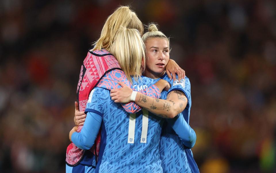 Lauren Hemp and Beth England look dejected after the final whistle