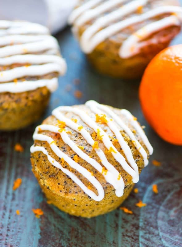 <p>Greek yogurt orange muffins with poppy seeds and sweet orange glaze. Moist and fluffy! Healthy recipe that’s perfect for easy breakfasts and snacks.</p><p><strong>Get the recipe: <a href="https://www.wellplated.com/orange-muffins/" rel="nofollow noopener" target="_blank" data-ylk="slk:Orange Muffins;elm:context_link;itc:0;sec:content-canvas" class="link rapid-noclick-resp"><em>Orange Muffins</em></a></strong></p>