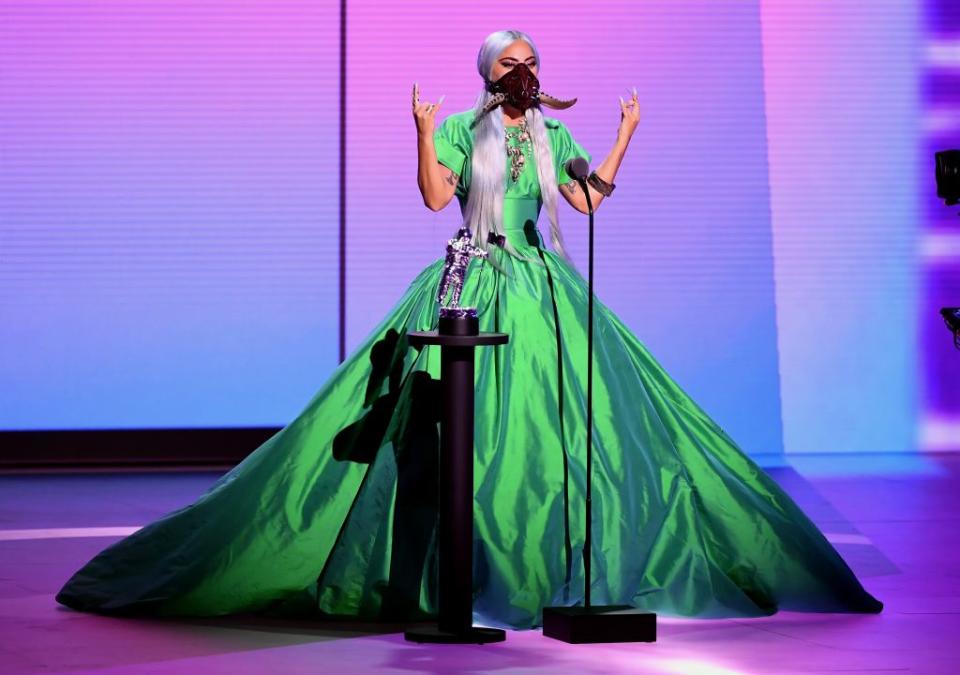 Lady Gaga accepting the Song of the Year award for “Rain on Me” onstage during the 2020 MTV Video Music Awards. - Credit: Getty Images for MTV