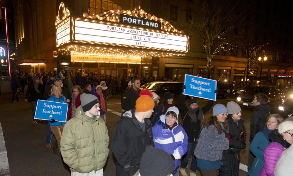 Teachers leave a meeting where they voted to strike in Portland, Oregon February 5, 2014. (REUTERS/Steve Dipaola)