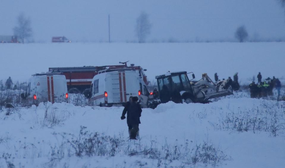 <p>Emergency services work at the scene where a short-haul regional Antonov AN-148 plane crashed after taking off from Moscow’s Domodedovo airport, outside Moscow, Russia on Feb. 11, 2018. (Photo: Maxim Shemetov/Reuters) </p>