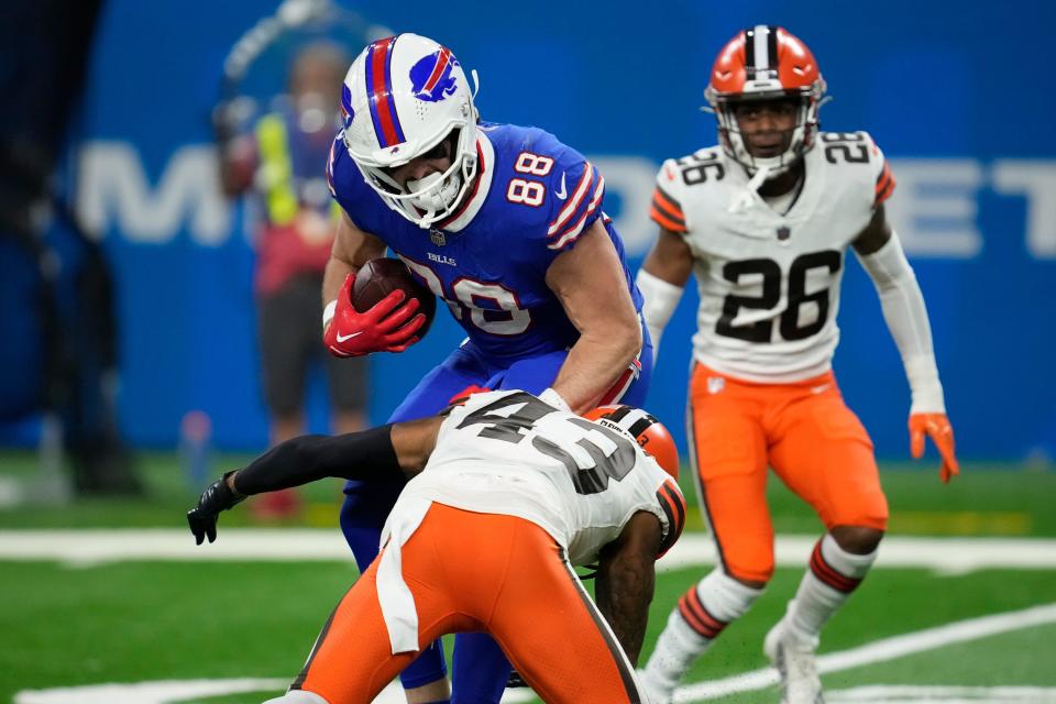 Cleveland Browns safety John Johnson III (43) tackles Buffalo Bills tight end Dawson Knox (88) during the second half of an NFL football game, Sunday, Nov. 20, 2022, in Detroit. (AP Photo/Paul Sancya)