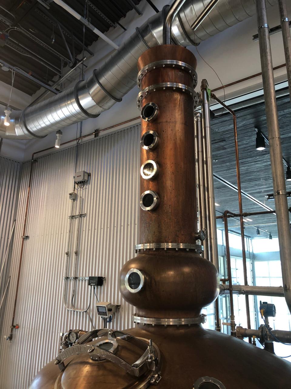 A massive copper still sits in the back of Fierce Whiskers Distillery.