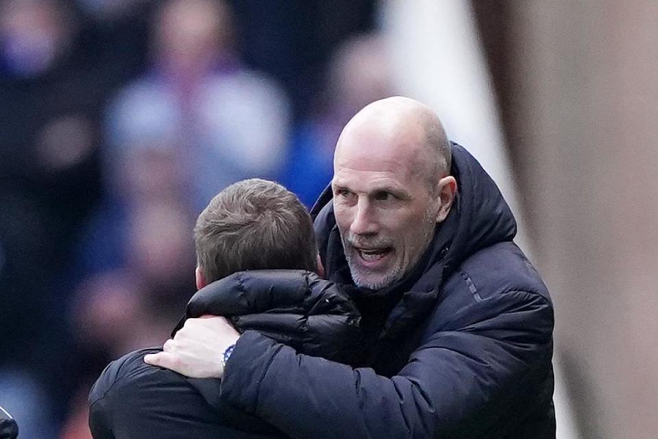 Rangers manager Philippe Clement and Celtic manager Brendan Rodgers shared a warm embrace after Sunday's game at Ibrox, and there is still little to separate their sides either. <i>(Image: PA)</i>