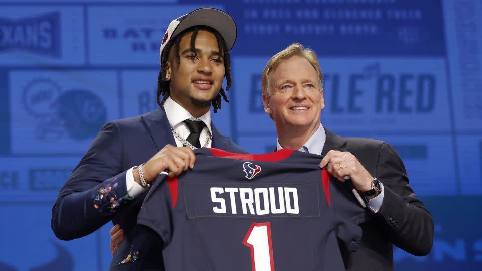 Stroud poses with NFL commissioner Roger Goodell after being selected by the Texans with the No. 2 pick in the first round of the 2023 NFL draft. - David Eulitt/Getty Images