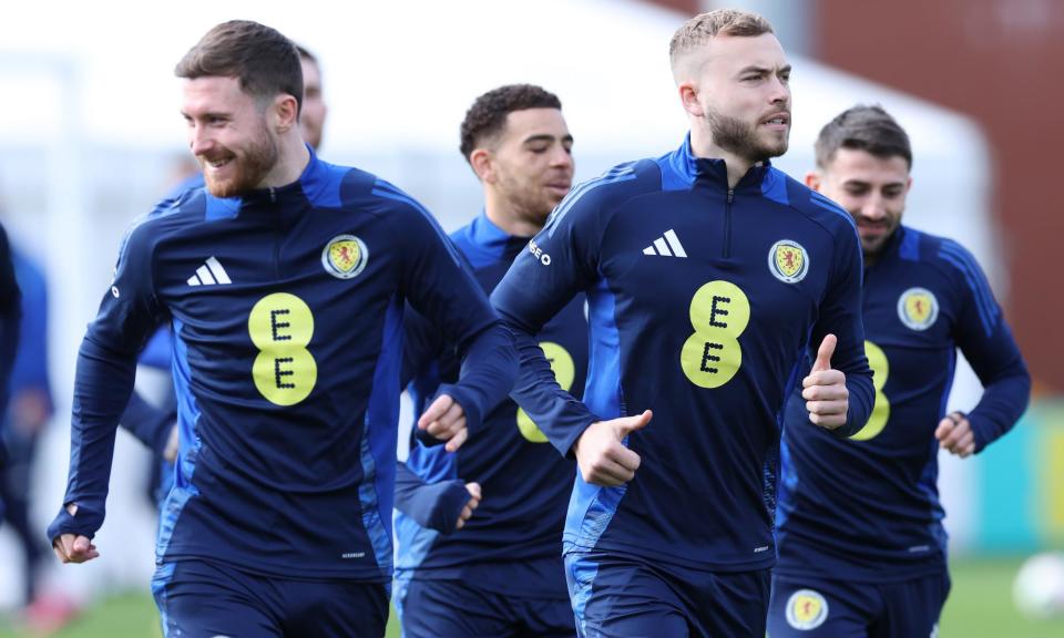<span>Scotland players, including Ryan Porteous (second right), train before the friendly against the Netherlands.</span><span>Photograph: Ian MacNicol/Getty Images</span>