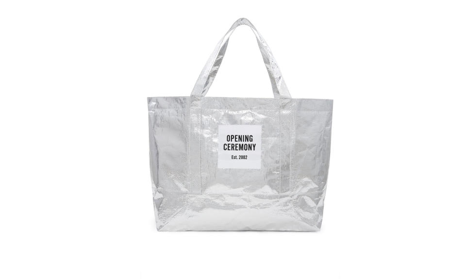 <p>Large metallic silver tote bag, $35,<a rel="nofollow noopener" href="https://www.openingceremony.com/mens/opening-ceremony/large-silver-chinatown-tote-bag-ST199969.html" target="_blank" data-ylk="slk:openingceremony.com;elm:context_link;itc:0;sec:content-canvas" class="link "> openingceremony.com</a> </p>