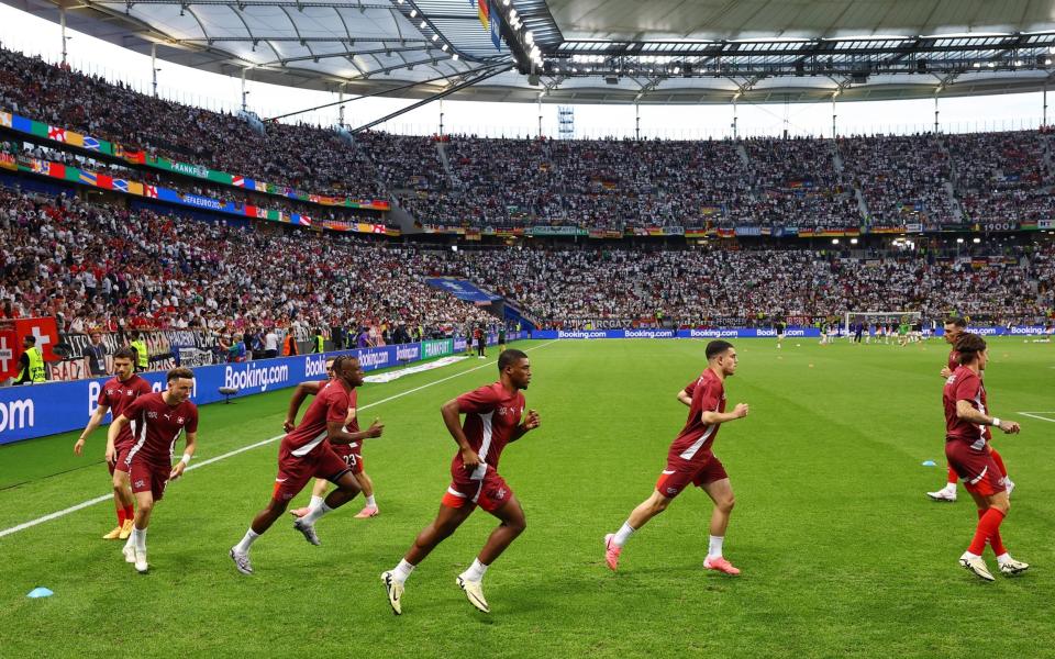 Switzerland players warm up