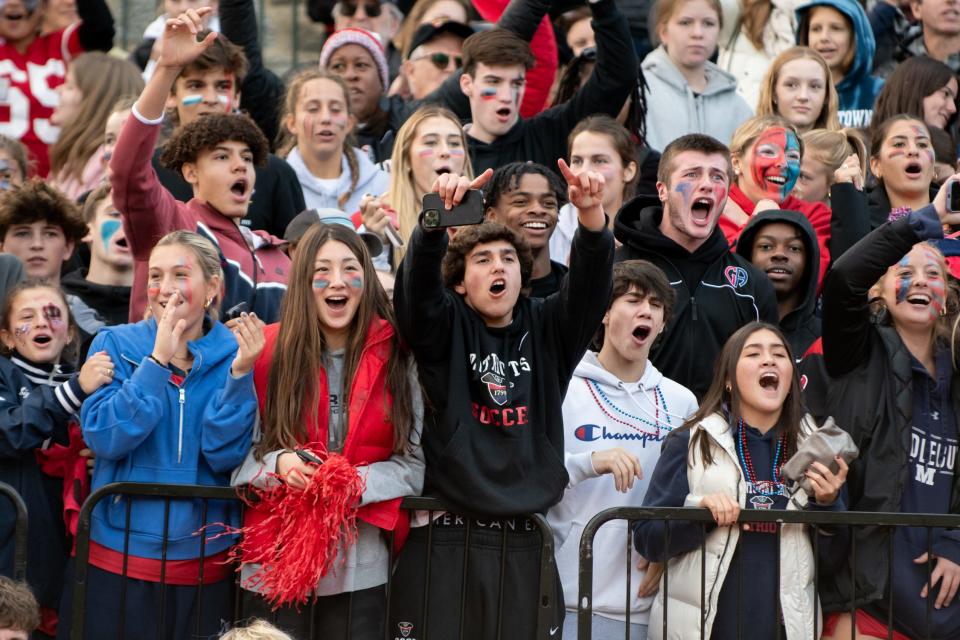 Germantown Academy students cheer on the Patriots during their rivalry game against Penn Charter.