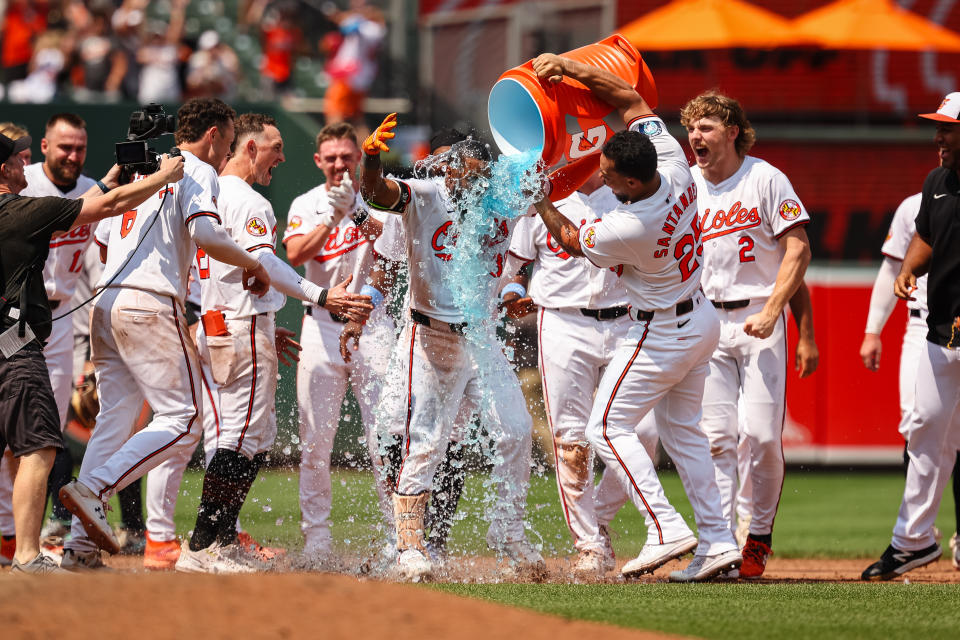 Cedric Mullins gets a Gatorade bath after playing the hero on Sunday. (Scott Taetsch/Getty Images)