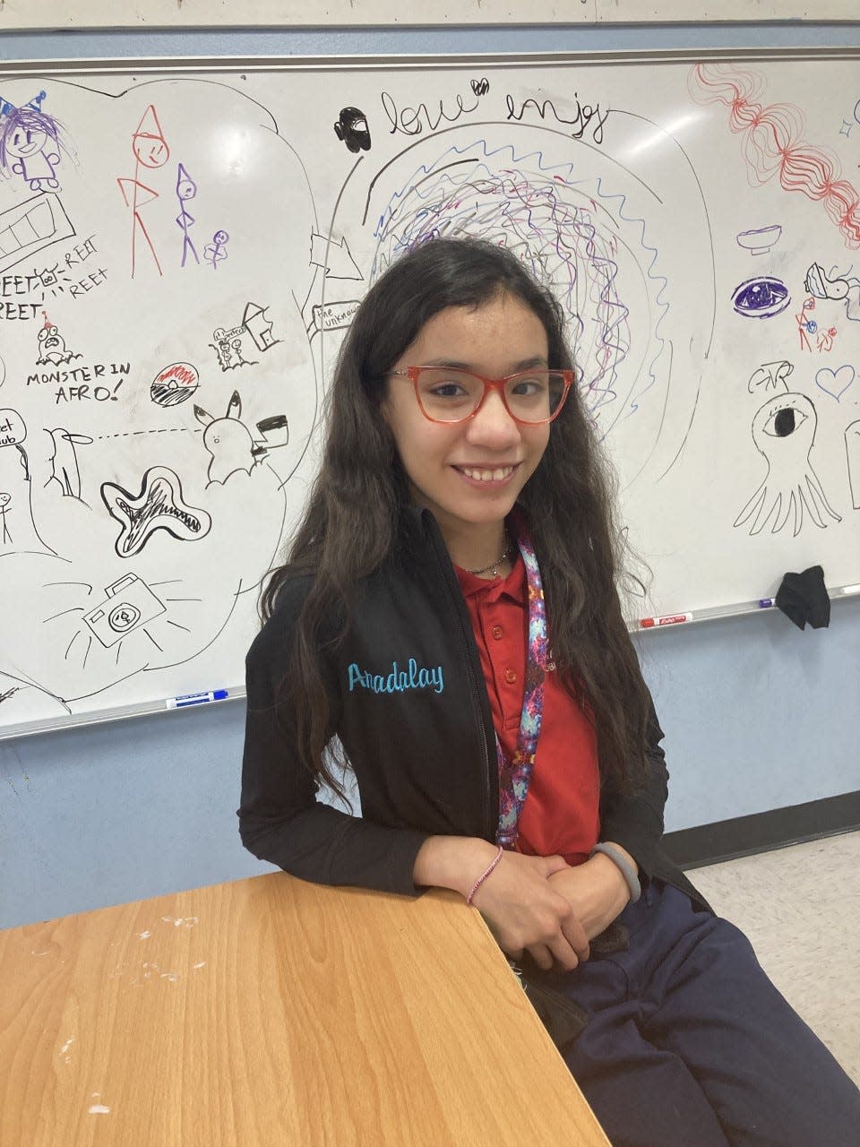 Harmony School of Excellence fifth-grader Anadalay Garcia, 11, expressed her emotions about completing elementary school and enduring through the pandemic in a special art exhibit opening this weekend.