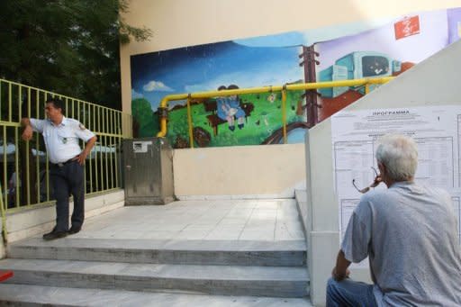 A man checks electoral lists outside a polling station in Thessaloniki. European leaders face difficult decisions in the days ahead on managing the outcome of the Greek election, upholding their credibility on financial discipline to avoid stoking contagion, and making convincing progress towards a grand plan for deeper integration.