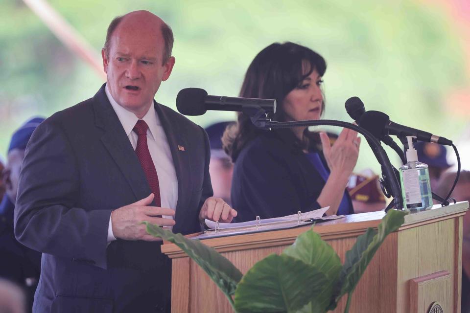 U.S. Sen. Chris Coons gives remarks during a Memorial Day ceremony Monday, May 30, 2022, at War Memorial Plaza near New Castle.