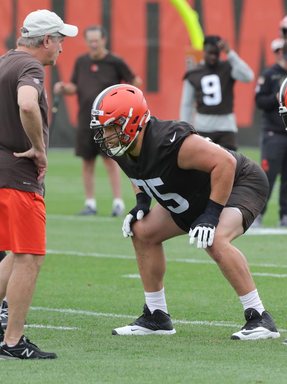 Cleveland Browns offensive lineman Joel Bitonio lines up in front of coach Bill Callahan during minicamp on Tuesday, June 14, 2022 in Berea.