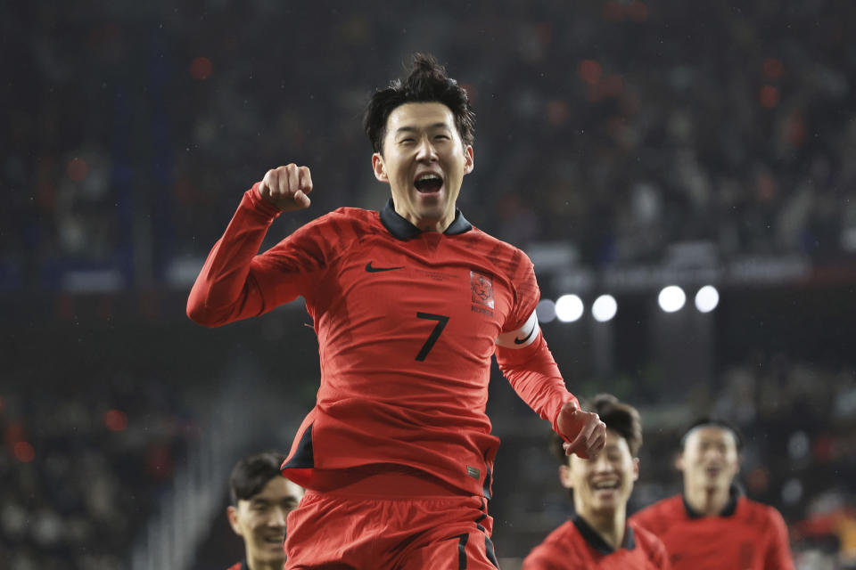 South Korea's Son Heung-min celebrates after scoring his side's opening goal against Colombia during their friendly soccer match between South Korea and Colombia in Ulsan, South Korea, Friday, March 24, 2023. (Kim Do-hun/Yonhap via AP)