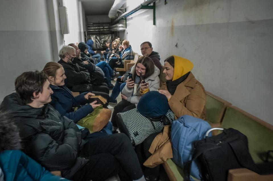 Workers of the Ukrainian public broadcasting company hide during an air raid in the basement of a Ukrainian radio house in Kyiv (Alina Smutko)