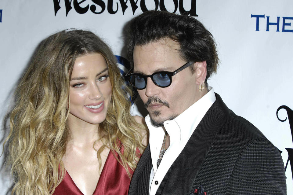 Photo by: Michael Germana/STAR MAX/IPx 2019 1/9/16 Amber Heard and Johnny Depp during The Art of Elysium's Ninth Annual Heaven Gala held in Culver City, California.