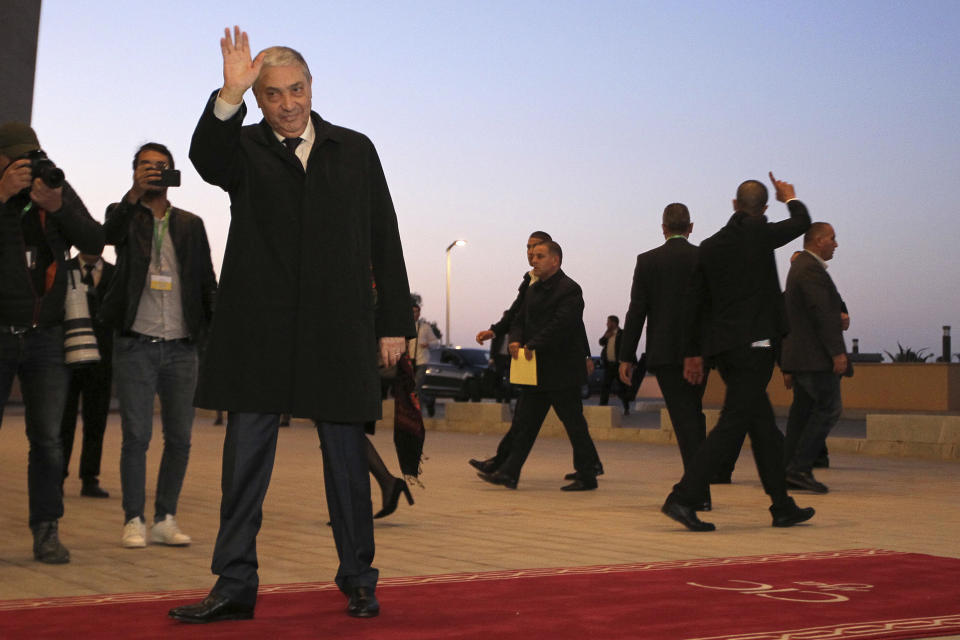 Algerian presidential candidate Ali Benlis arrives for televised debate in Algiers, Friday, Dec. 6, 2019. Restive Algeria is holding its first - and sole - televised presidential debate ahead of the consequential Dec. 12 poll. Five all-male candidates - Azzedine Mihoubi, Abdelmadjid Tebboune, Abdelkader Bengrina, Ali Benflis et Abdelaziz Belaid - are vying to make their case Friday evening to lead the North African country. (AP Photo/Fateh Guidoum)