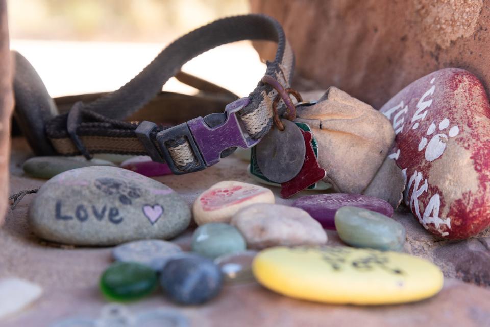 A collar and some stones at Angels Rest at Best Friends Animal Sanctuary in Kanab on Thursday, July 27, 2023. Angels Rest is the final resting spot for thousands of beloved pets. | Megan Nielsen, Deseret News