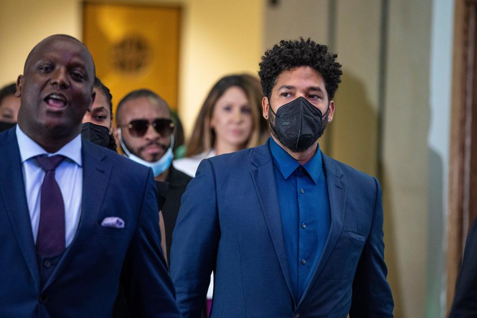 Attorney Nenye Uche, left, and Jussie Smollett leave a hearing at the Leighton Criminal Courthouse in Chicago, July 14, 2021.
