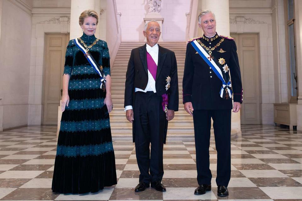 <p>BENOIT DOPPAGNE/BELGA MAG/AFP via Getty Images</p> Queen Mathilde of Belgium, President of Portugal Marcelo Rebelo de Sousa and King Philippe at Laeken Castle on October 17