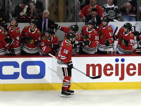 Dec 12, 2018; Chicago, IL, USA; Chicago Blackhawks center Marcus Kruger (16) celebrates his goal against the Pittsburgh Penguins during the third period at United Center. Mandatory Credit: David Banks-USA TODAY Sports