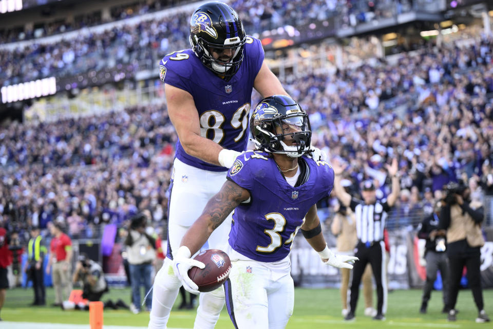 Baltimore Ravens running back Keaton Mitchell (34) celebrates with teammate tight end Mark Andrews (89) after scoring on a 40-yard touchdown run during the second half of an NFL football game against the Seattle Seahawks, Sunday, Nov. 5, 2023, in Baltimore. (AP Photo/Nick Wass)